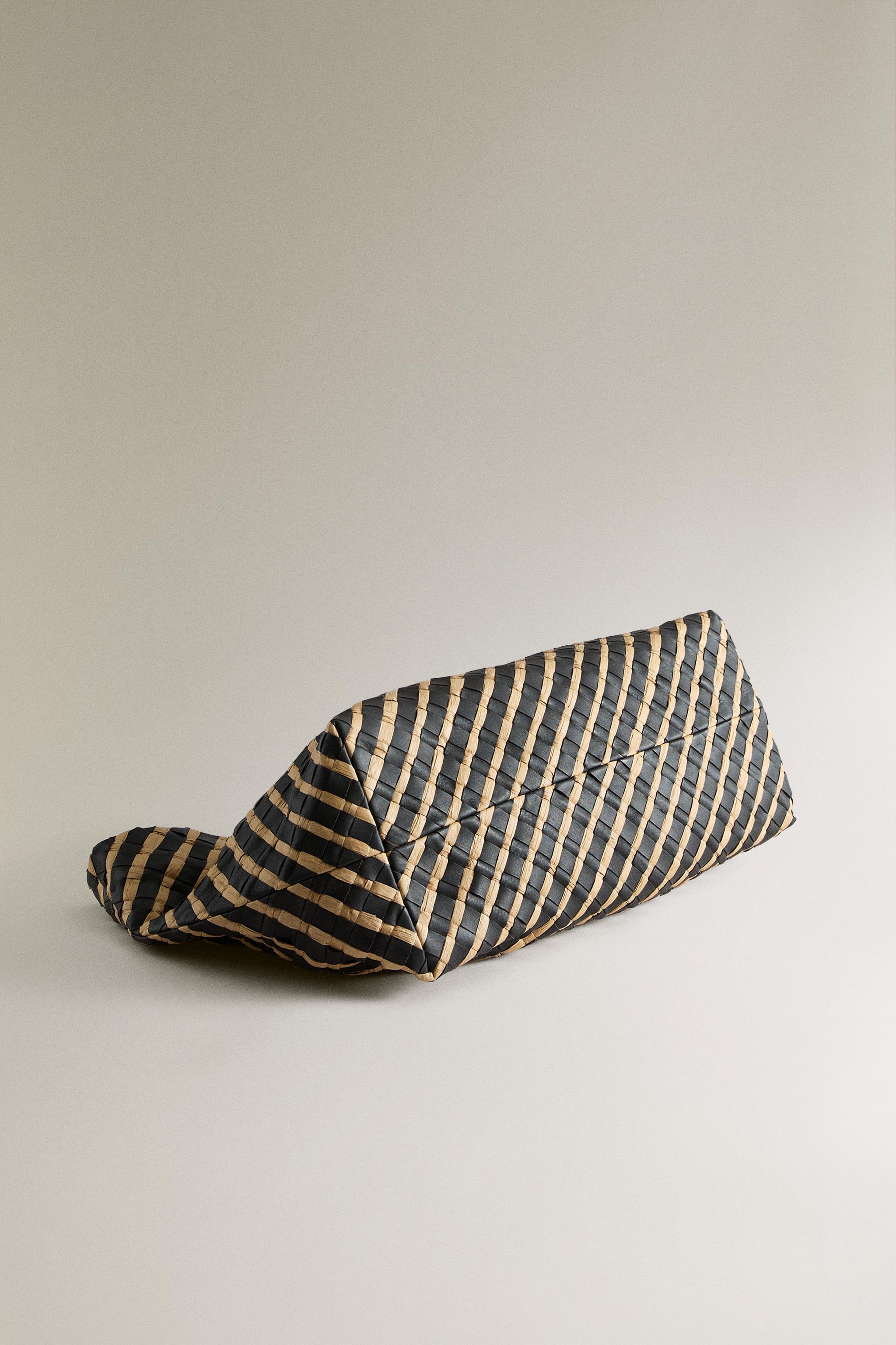 WOVEN LEATHER CLUTCH